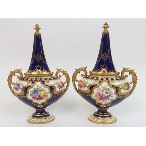 501 - A pair of Royal Crown Derby urns and covers