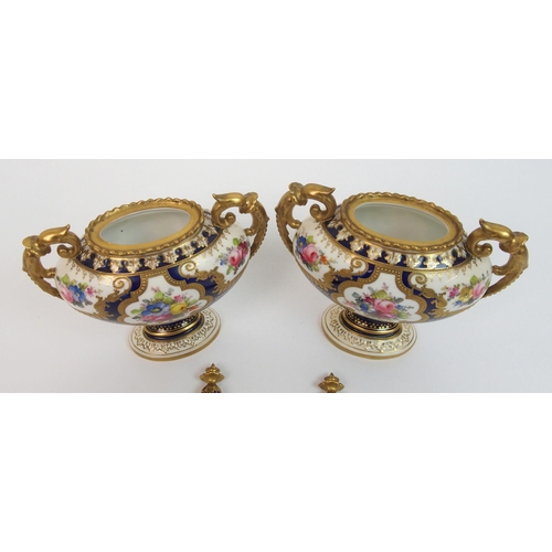 501 - A pair of Royal Crown Derby urns and covers