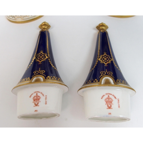 501 - A pair of Royal Crown Derby urns and covers