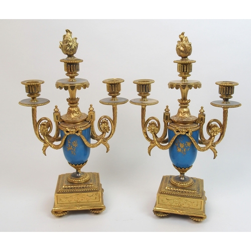 505 - A French gilt metal and porcelain clock garniture by Gantier  Paris