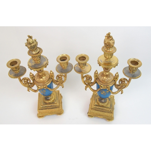 505 - A French gilt metal and porcelain clock garniture by Gantier  Paris