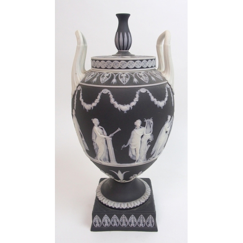 509 - A Wedgwood black jasper dip two-handled urn and cover