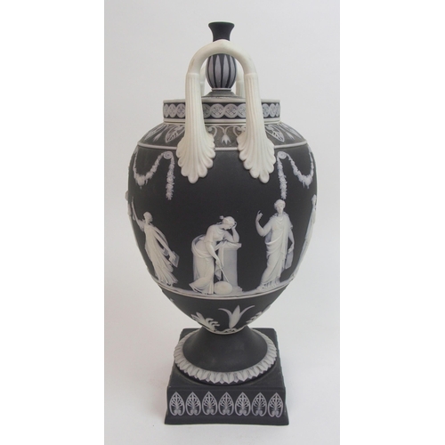 509 - A Wedgwood black jasper dip two-handled urn and cover