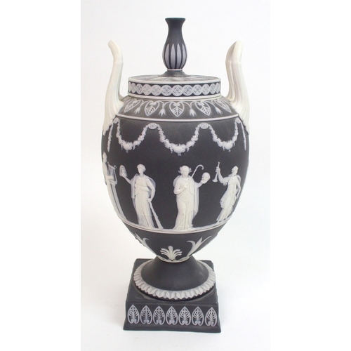 509 - A Wedgwood black jasper dip two-handled urn and cover