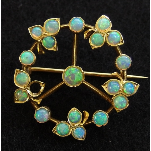 633 - An opal and diamond Edwardian pendant brooch