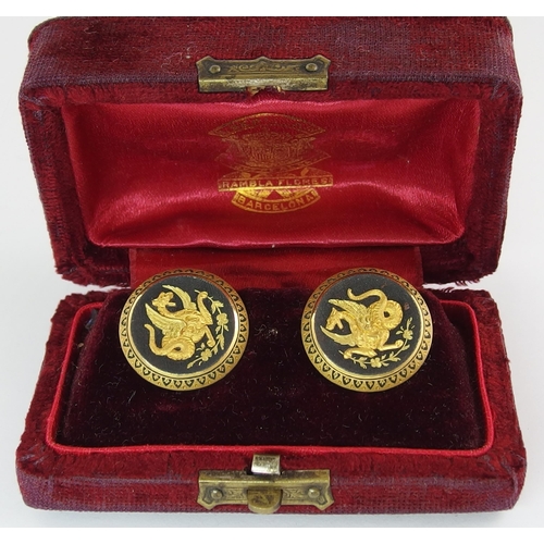 638 - A pair of Spanish Damascene cufflinks