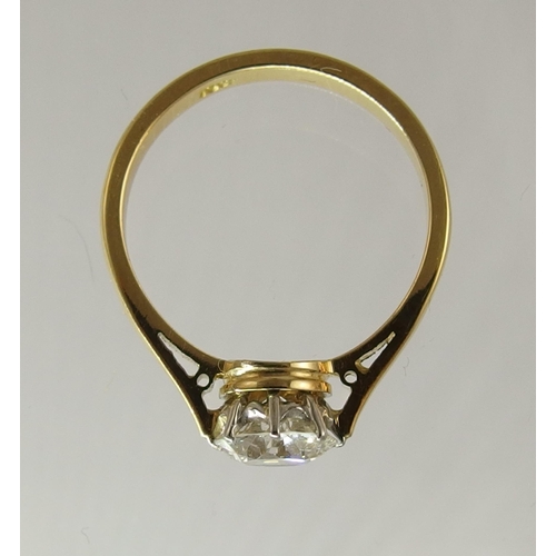 639 - An 18ct yellow and white gold diamond solitaire ring