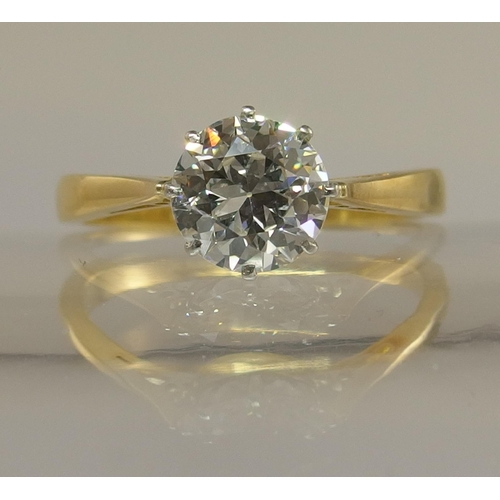 639 - An 18ct yellow and white gold diamond solitaire ring