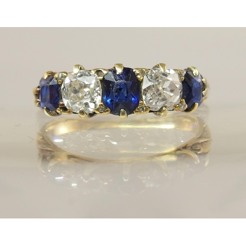 641 - An 18ct sapphire and diamond ring