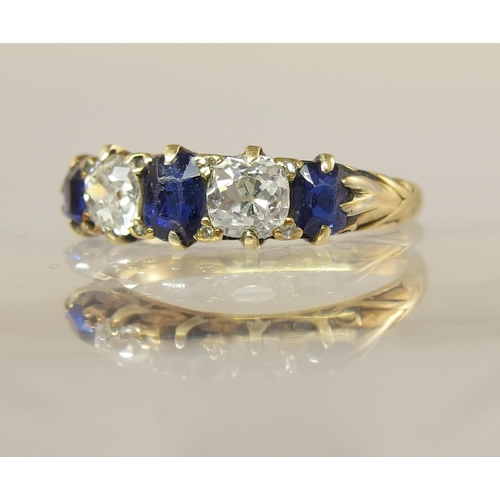 641 - An 18ct sapphire and diamond ring