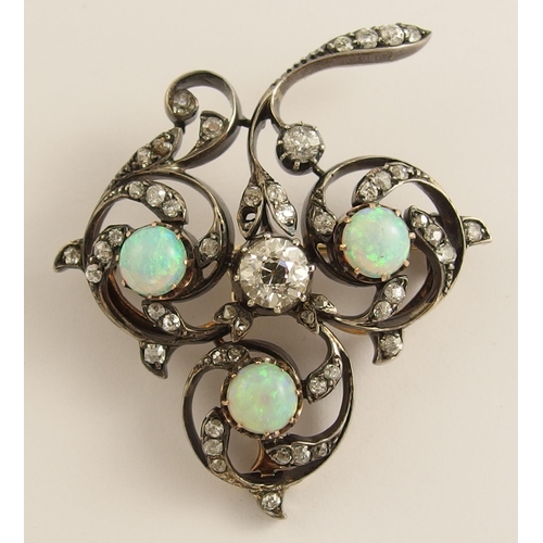 645 - An opal and diamond brooch