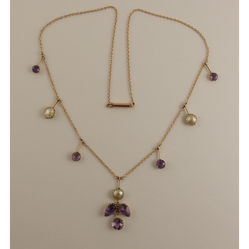 648 - An Arts & Crafts necklet in amethyst and blister pearls