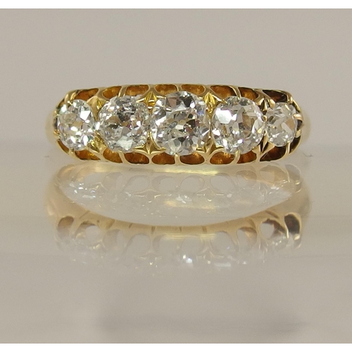 651 - A five stone diamond ring