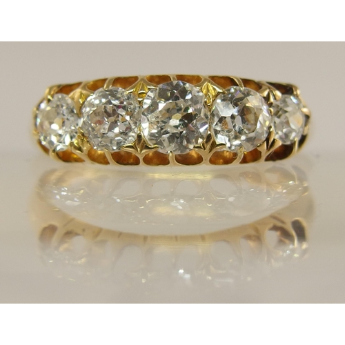 651 - A five stone diamond ring