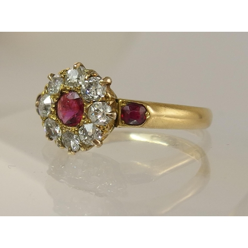 652 - A Victorian ruby and diamond cluster ring