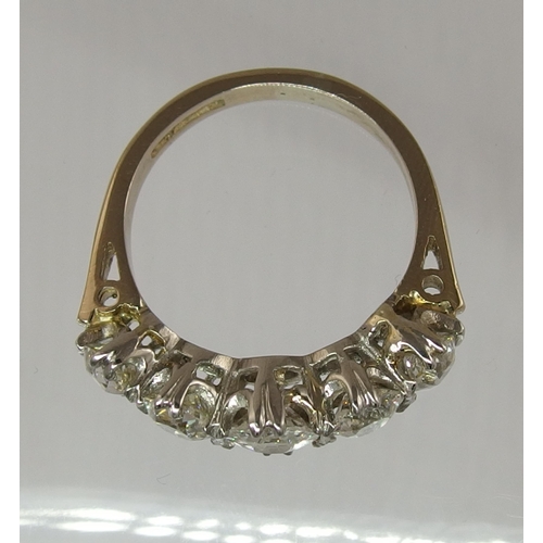 653 - An 18ct gold five stone diamond ring