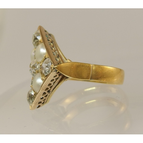 655 - A 22ct gold diamond and pearl ring