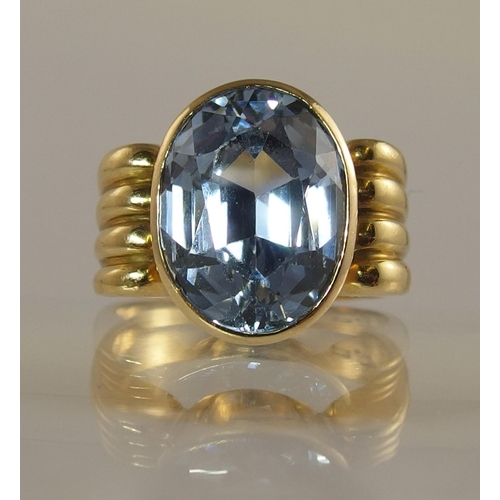 666 - An 18ct yellow gold blue gem retro ring