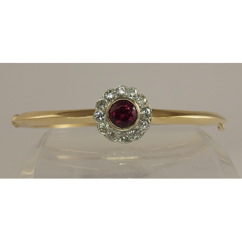 669 - A ruby and diamond bangle