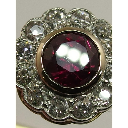 669 - A ruby and diamond bangle