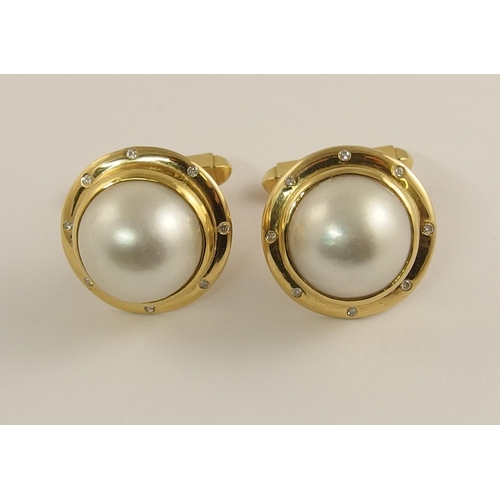 671 - A pair of mabe pearl and diamond cufflinks