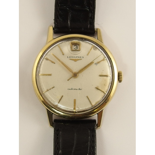 678 - A 9ct gold Gents Longines Automatic watch