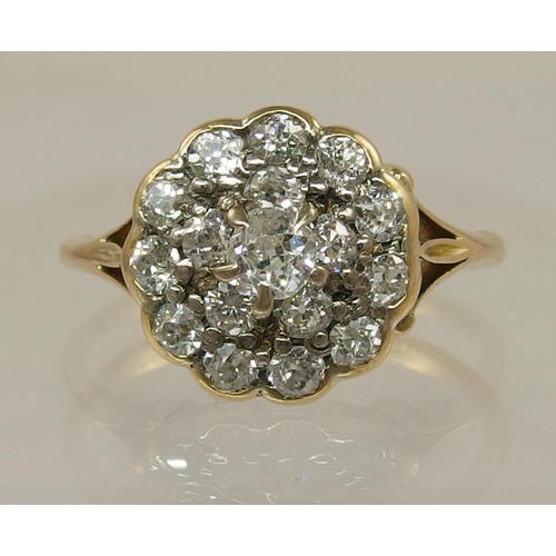 686 - An 18ct gold diamond cluster ring