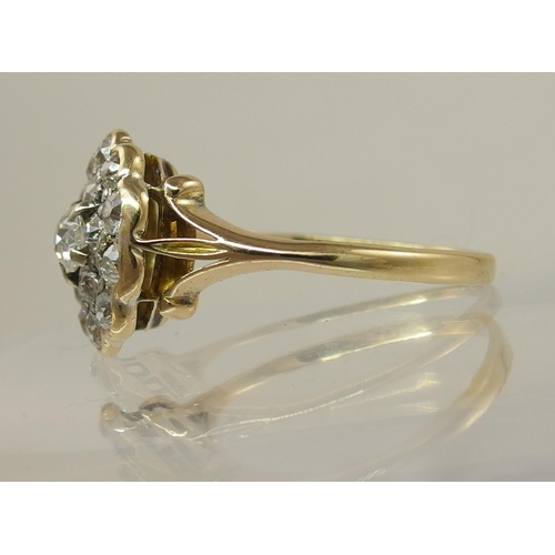 686 - An 18ct gold diamond cluster ring