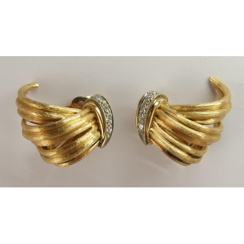 687 - A pair of 14ct gold ear clips