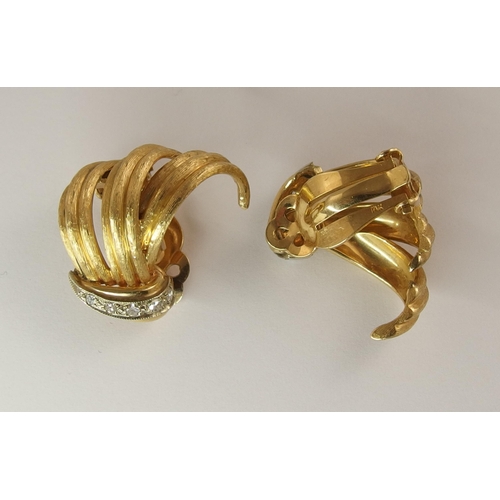 687 - A pair of 14ct gold ear clips