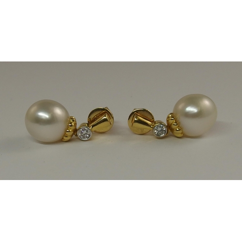 690 - A pair of 18ct gold diamond and pearl earrings