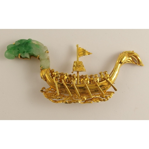 694A - A Chinese 22ct dragon boat brooch