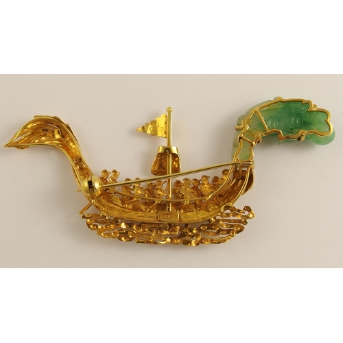 694A - A Chinese 22ct dragon boat brooch