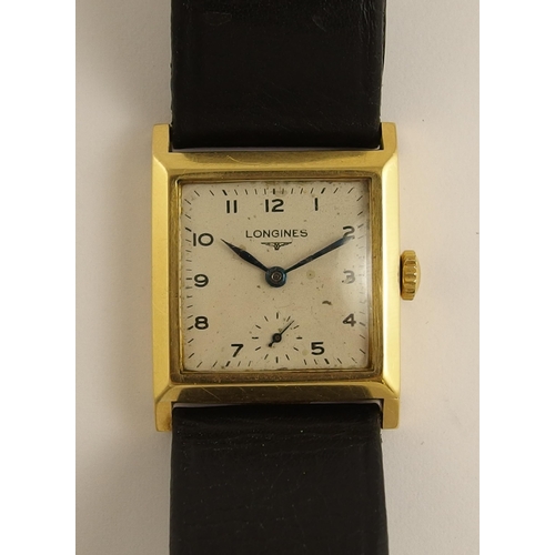 703 - An 18ct gold Longines with a tank style case