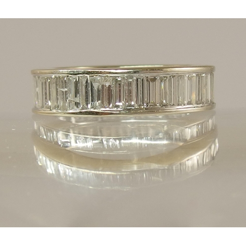 741 - An 18ct white gold baguette cut diamond full eternity ring