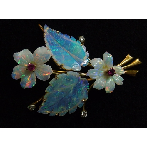 742 - An 18ct gold carved opal flower brooch