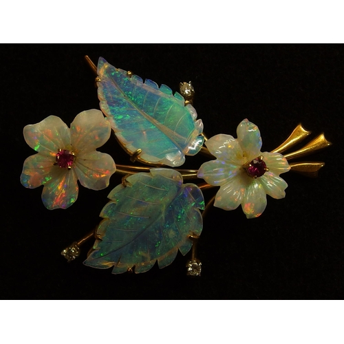 742 - An 18ct gold carved opal flower brooch