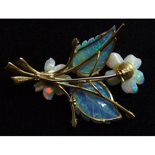 742 - An 18ct gold carved opal flower brooch