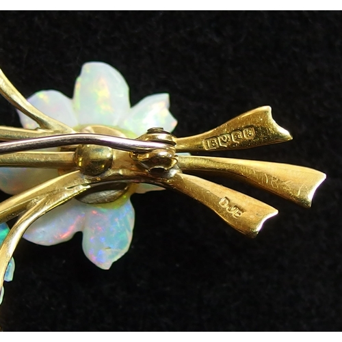 742 - An 18ct gold carved opal flower brooch