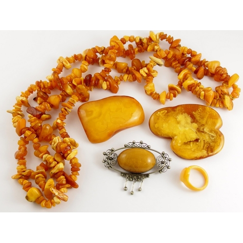 745 - A collection of yellow amber coloured items