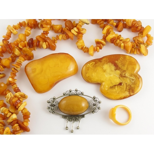 745 - A collection of yellow amber coloured items