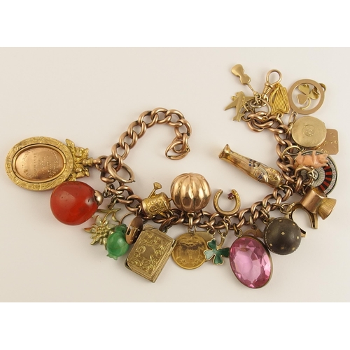 746 - A 9ct gold charm bracelet