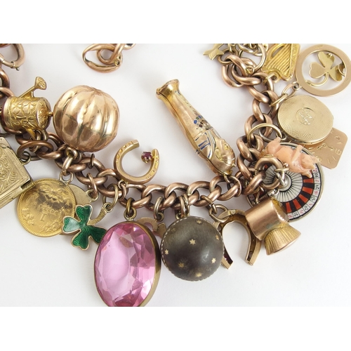 746 - A 9ct gold charm bracelet