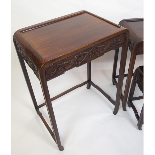 806 - A Chinese hardwood nest of four rectangular pedestal tables