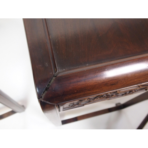 806 - A Chinese hardwood nest of four rectangular pedestal tables