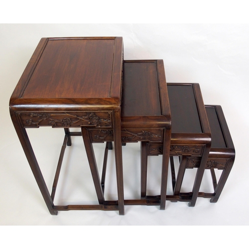 806 - A Chinese hardwood nest of four rectangular pedestal tables