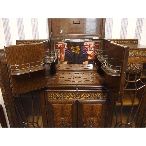 811 - An Art Deco oak and walnut veneered cocktail cabinet