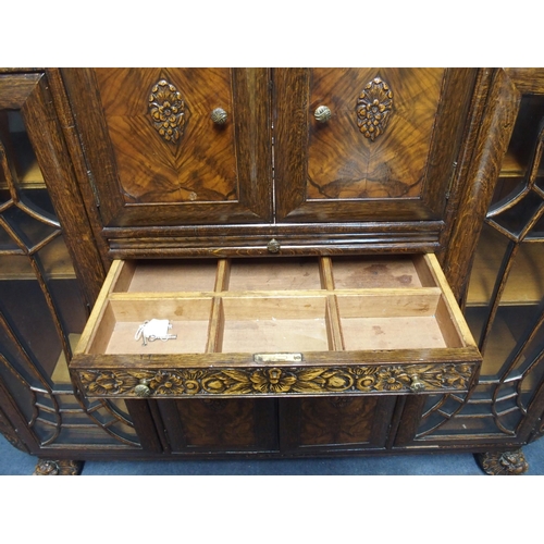 811 - An Art Deco oak and walnut veneered cocktail cabinet