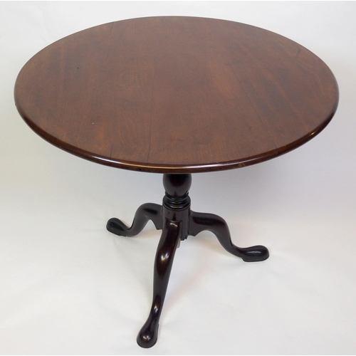 815 - A Georgian mahogany circular snap-top tripod table