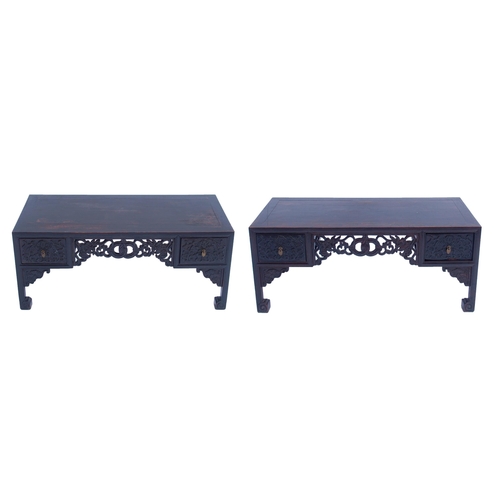 818 - A pair of Chinese hardwood low tables